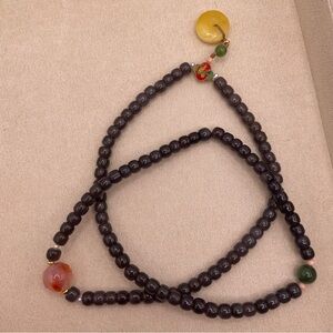 Elegant Purple Beaded Jade Necklace with Amber Pendant